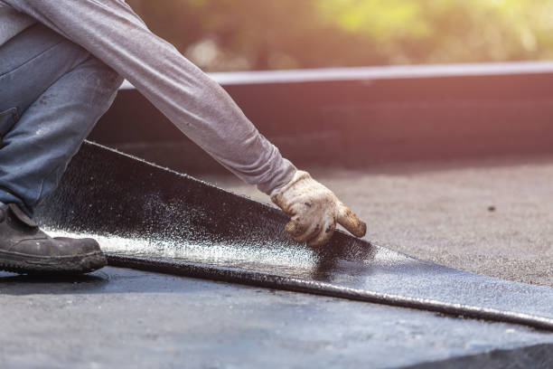 Professional Basement Waterproofing technician working in Oakwood, OH